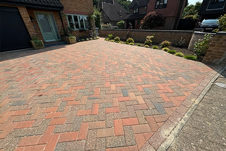 Expert landscapers build brick weave driveway