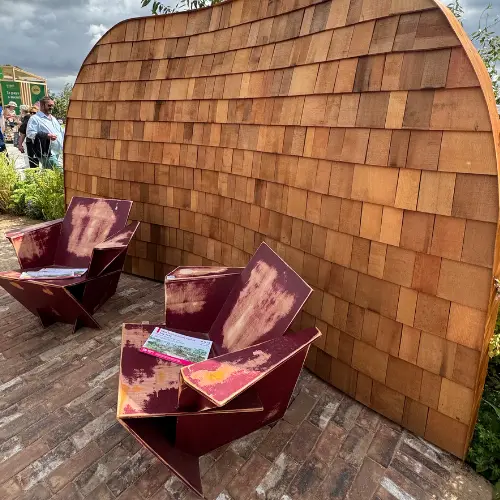 Curved shingle walls RNIB Sandringham show garden 2026